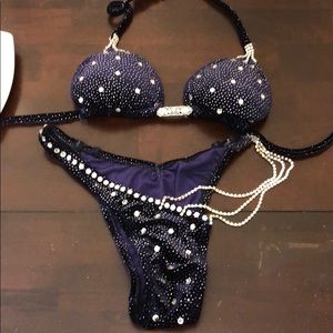 Brand new, never worn competition suit.